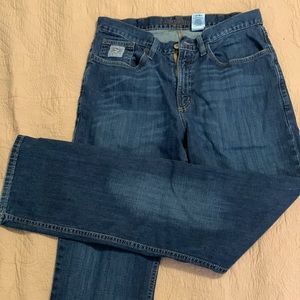 Cinch jeans, stretch in the material, believe it’s called arena flex